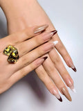 Warm brown style mixed color French tip press on nails with gold solid color and glossy finishes. Perfect for daily use, office, dates, parties, holidays and special occasions. Long almond shape fake nails with a chic, versatile design.