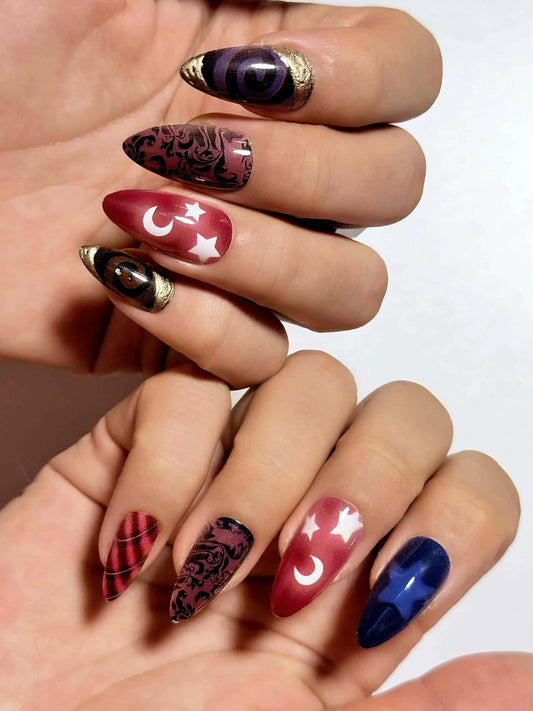 Magical celestial press on nails with star and moon motifs, elegant swan patterns, and rich mixed jewel tones with gold foil accents. Perfect for holiday parties, dates and special occasions. Medium length almond shape fake nails with a whimsical, enchanted finish.
